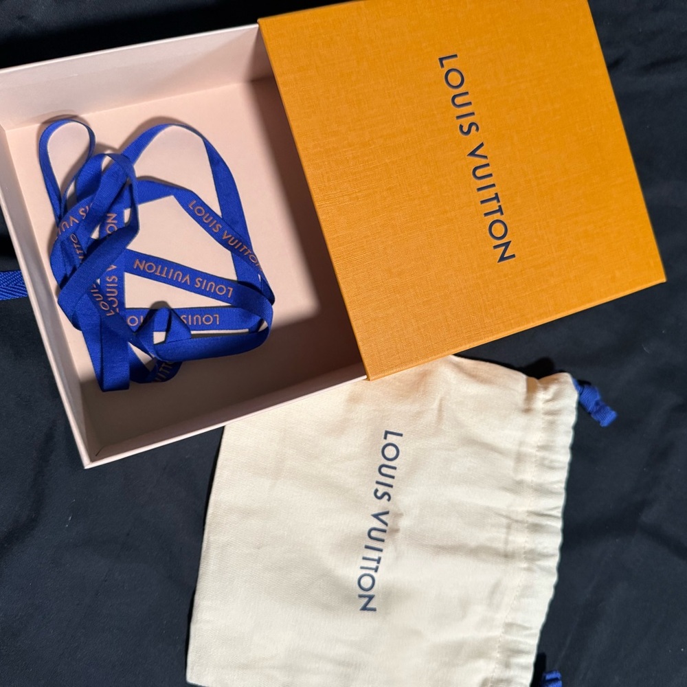 Louis Vuitton Cream Pouch with Blue Logo